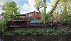 About the Willowtree Inn: view from the creek of the back decks.